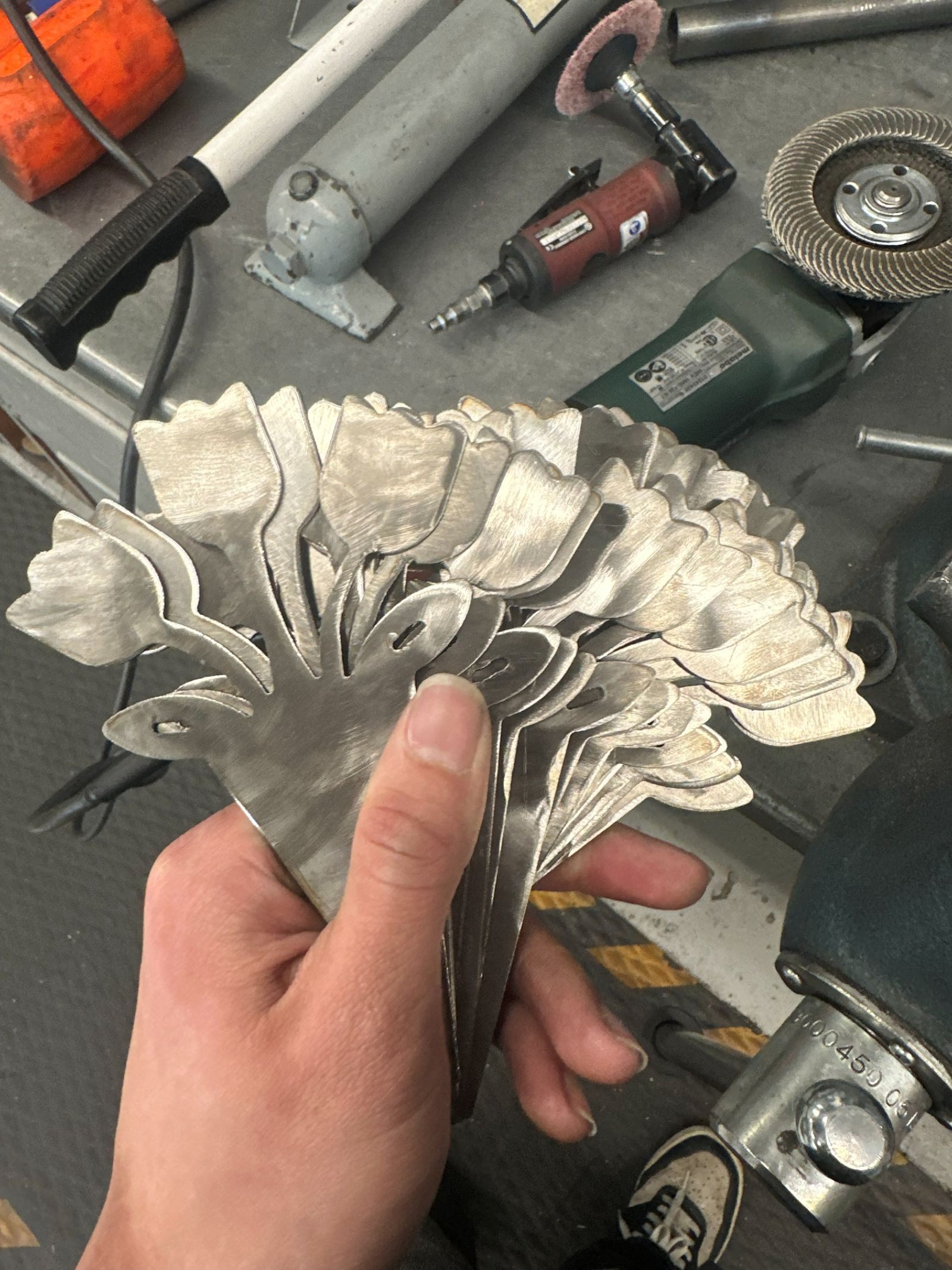 Plasma-cut metal flowers.